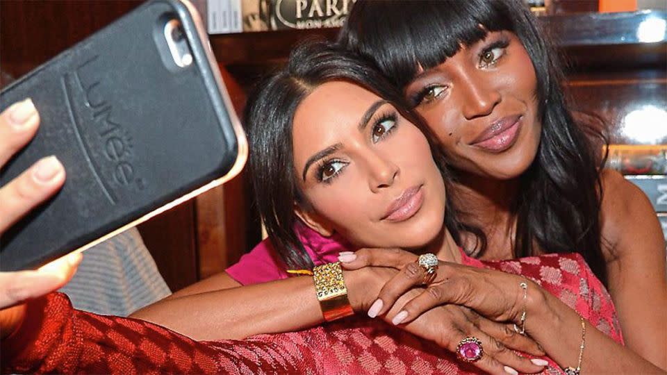 Kim Kardashian and Naomi Campbell pose for a selfie. Photo: Yahoo UK