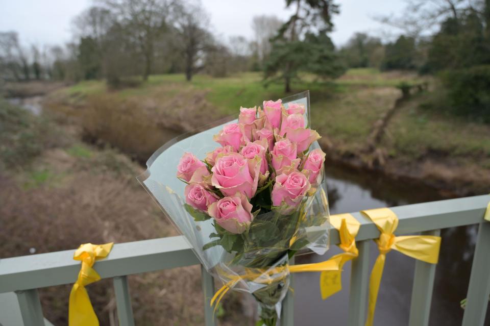 Flowers, and ribbons on a bridge over the River Wyre in St Michael's on Wyre, Lancashire, after police announced that the body recovered from the River Wyre on Sunday, was that of Nicola Bulley, who disappeared on January 27. Picture date: Tuesday February 21, 2023.