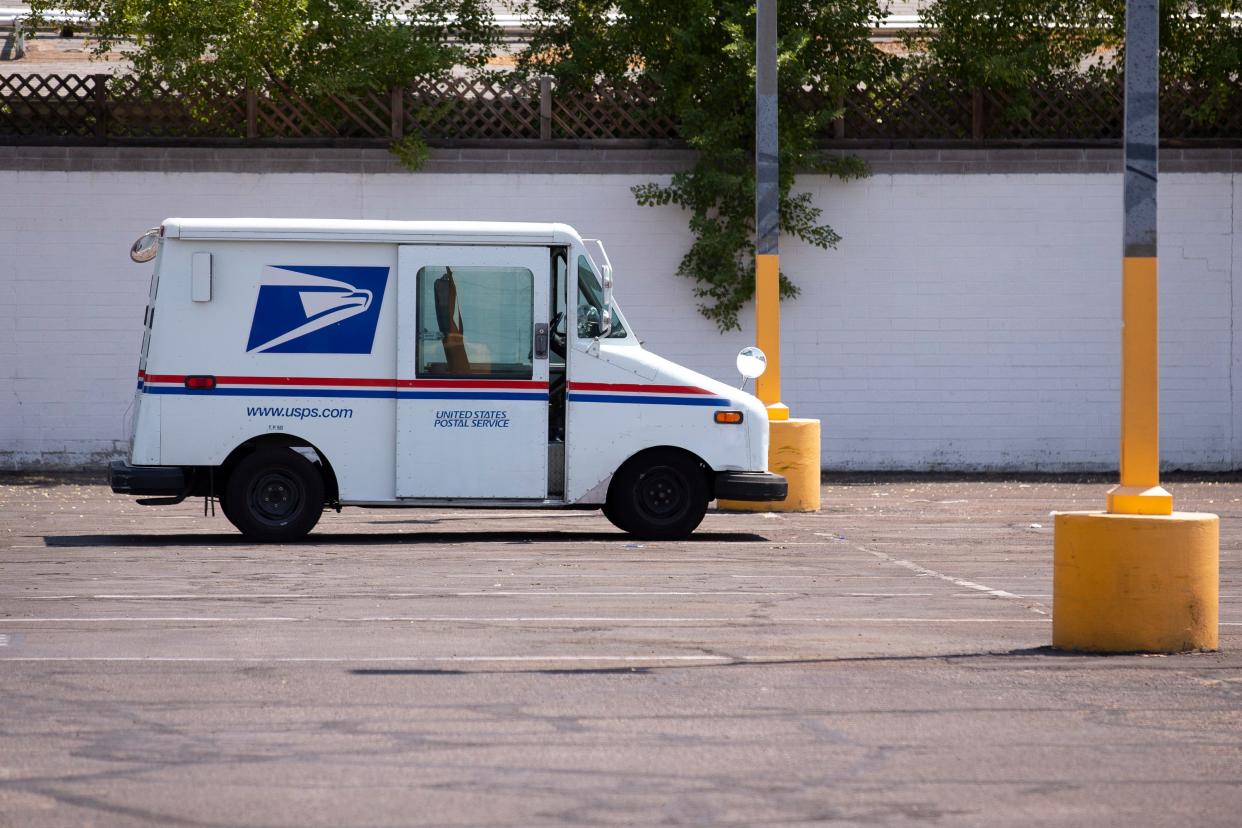A United States Postal Service delivery truck is seen at the USPS office on Seventh Avenue south of Indian School Road on Aug. 18, 2020, in Phoenix.