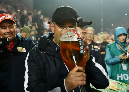 Soccer Football - Bundesliga Relegation Playoff - Union Berlin v VfB Stuttgart - Stadion An der Alten Forsterei, Berlin, Germany - May 27, 2019 Union Berlin coach Urs Fischer celebrates after winning the match REUTERS/Annegret Hilse DFL regulations prohibit any use of photographs as image sequences and/or quasi-video