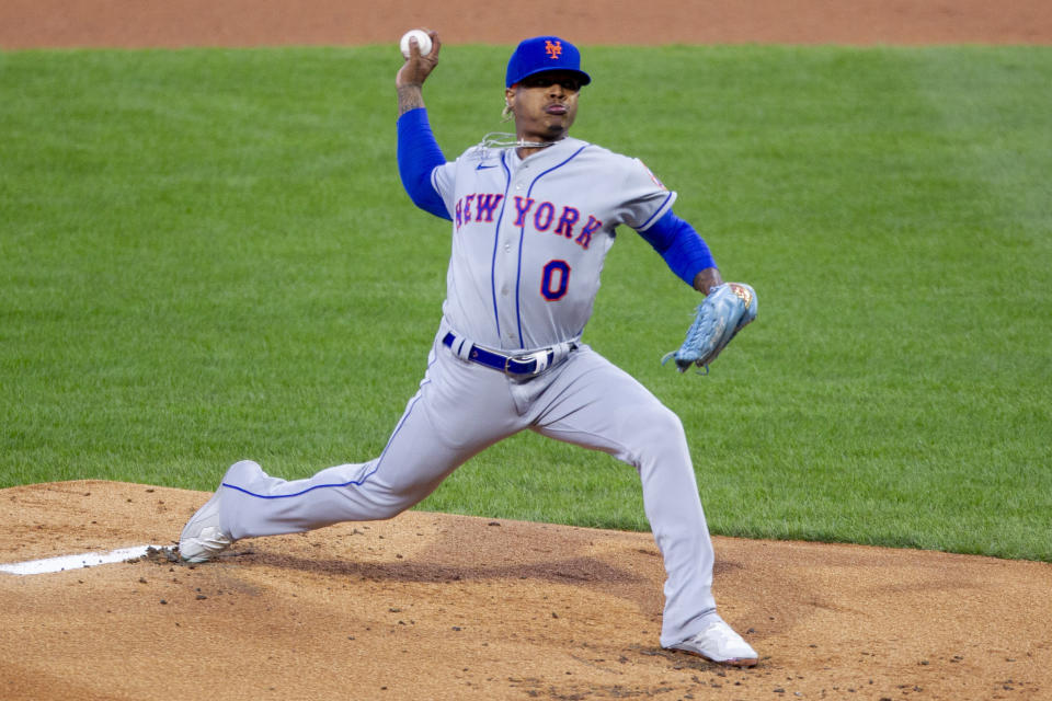 New York Mets starting pitcher Marcus Stroman (0) throws during the first inning of a baseball game against the Philadelphia Phillies, Tuesday, April 6, 2021, in Philadelphia. (AP Photo/Laurence Kesterson)