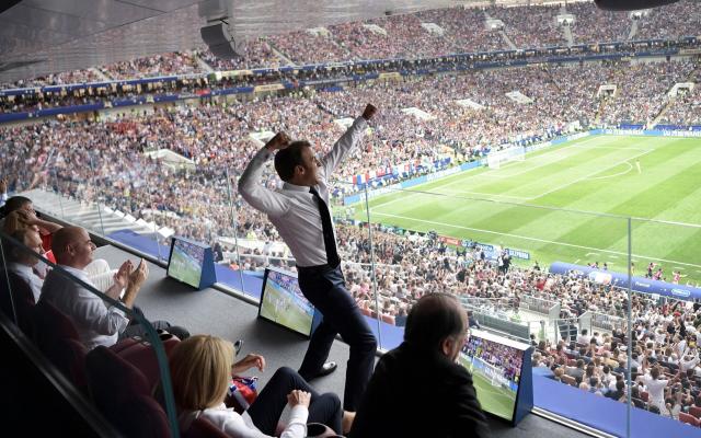 French President Emmanuel Macron reacts during the final match between France and Croatia at the 2018 soccer World Cup - Alexei Nikolsky/AP
