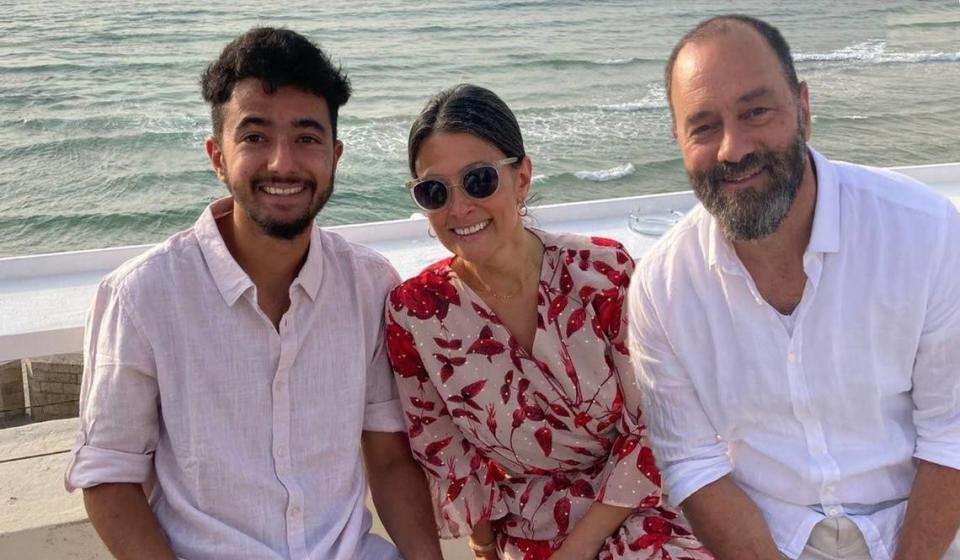 Hersh Goldberg-Polin, taken hostage by Hamas during the Supernova Music Festival in Southern Israel, with his mother, Rachel Goldberg, and his father, Jonathan Polin. His parents now work around the clock to advocate for his release.