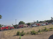 This Saturday, June 19, 221, photo released by the Timber Mesa Fire and Medical District shows emergency personnel at the scene of a mass casualty incident near Downtown 9 in Show Low, Ariz., Saturday, June 19, 2021. Police say a driver in a pickup truck has plowed into bicyclists competing in a community road race in Arizona, critically injuring several riders. Authorities say officers then chased down the driver and shot him outside a nearby hardware store. Police say six cyclists have been taken to a hospital in critical condition after the crash in the mountain town, northeast of Phoenix. The 35-year-old suspect also has been hospitalized in critical condition. (Timber Mesa Fire and Medical District via AP)