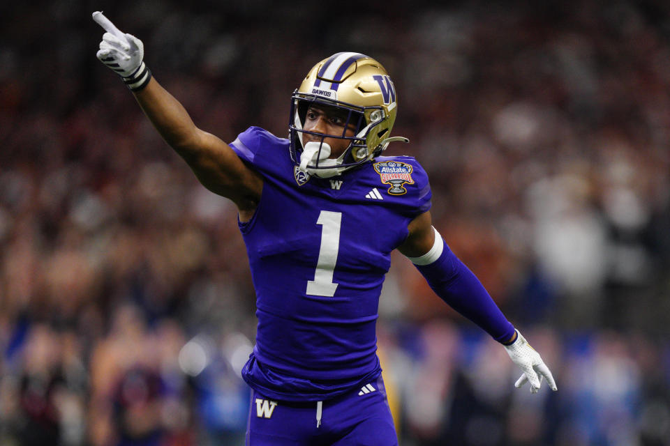 Washington cornerback Jabbar Muhammad (1) celebrates a recovered fumble against Texas during the second half of the Sugar Bowl CFP NCAA semifinal college football game, Monday, Jan. 1, 2024, in New Orleans. (AP Photo/Jacob Kupferman)