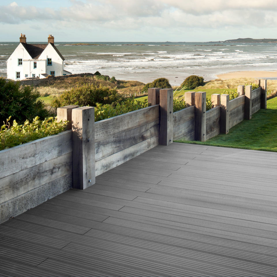 <p> Cool, composite garden decking make a perfect contrast with weathered wood boards. Choose one to make up your outdoor decking, and the other for your fencing. This way, you get a stylish look and get the best of both materials. Our natural inclination would be composite on the decking and real woods for the fence area. </p>