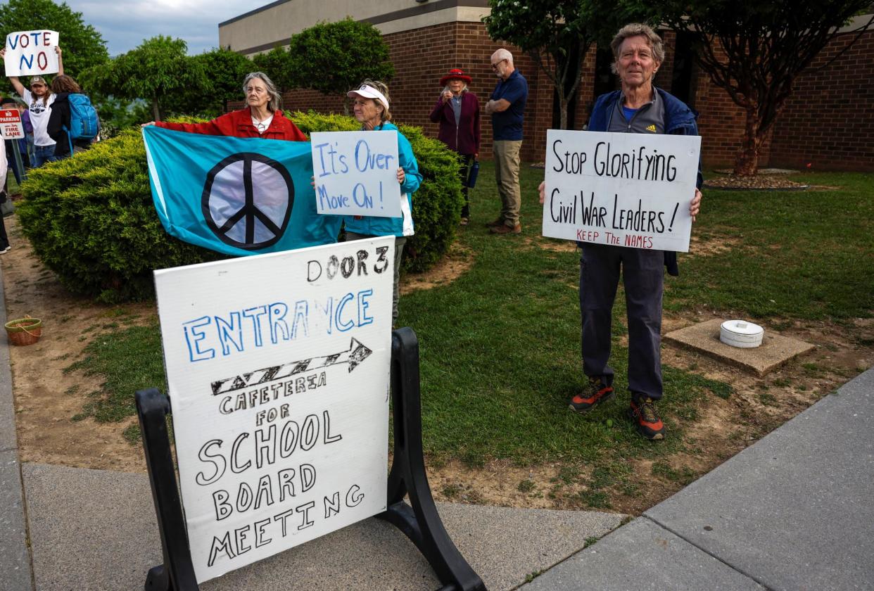 <span>Demonstrators call on the Shenandoah county school board to vote against naming two public schools after Confederate leaders on Thursday.</span><span>Photograph: Evelyn Hockstein/Reuters</span>