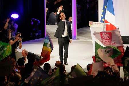 Benoit Hamon, French Socialist party 2017 presidential candidate, attends a campaign rally in Villeurbanne near Lyon, France April 11, 2017. REUTERS/Emmanuel Foudrot