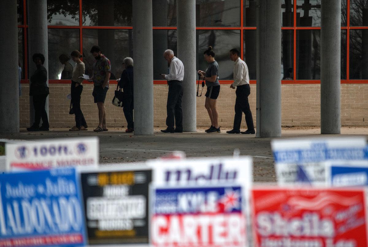 People line up to vote March 5, 2024 outside of the Metropolitan Multi-Service Center in Houston.