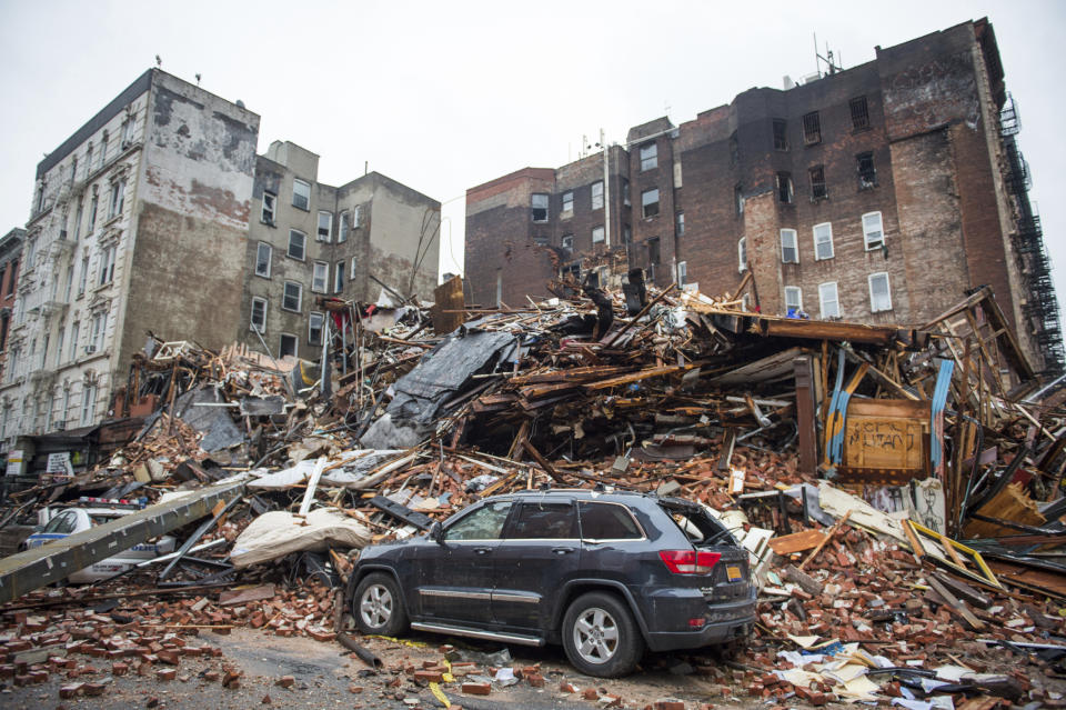 FILE - In this March 27, 2015, file photo, a pile of debris remains at the site of a building explosion in the East Village neighborhood of New York. Three people were convicted of manslaughter, Friday, Nov. 15, 2019, in the 2015 East Village building explosion that killed two men. (Nancy Borowick/The New York Times via AP, Pool)