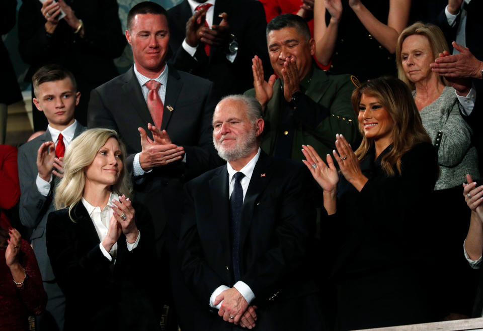 Limbaugh, with wife Kathryn and First Lady Melania Trump, is recognized by President Donald Trump in his State of the Union address in the House chamber on Feb. 4, 2020. He was later presented with a Presidential Medal of Freedom.<span class="copyright">Leah Millis—Pool/Getty Images</span>