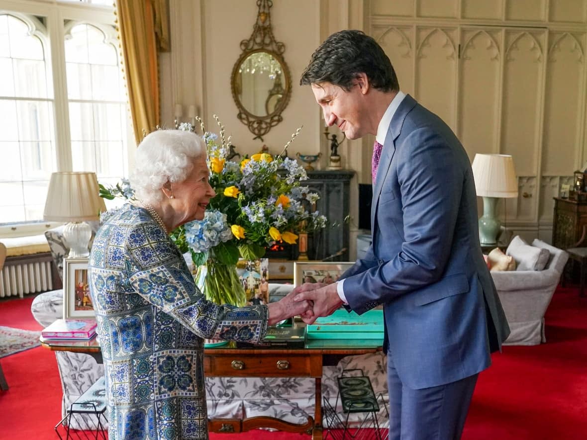 The Queen receives Prime Minister Justin Trudeau during an audience at Windsor Castle on March 7, 2022. Monarchists in Canada aren't happy with what the federal government has planned to mark the Queen's seven-decade reign. (Steve Parsons/Pool via AP Photo - image credit)