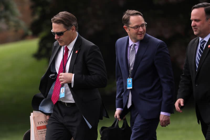 FILE PHOTO: White House aide Blair, Deputy Assistant to the President Hoelscher and White House Director of Social Media Scavino walk to Marine One helicopter for travel to Florida from White House in Washington