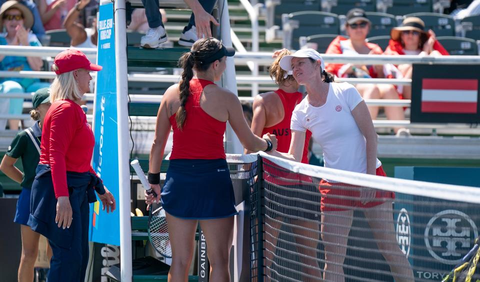 Jessica Pegula, left, celebrates winning her match Saturday against Austria's Julia Grabher in the Billie Jean King Cup qualifier at the Delray Beach Tennis Center.