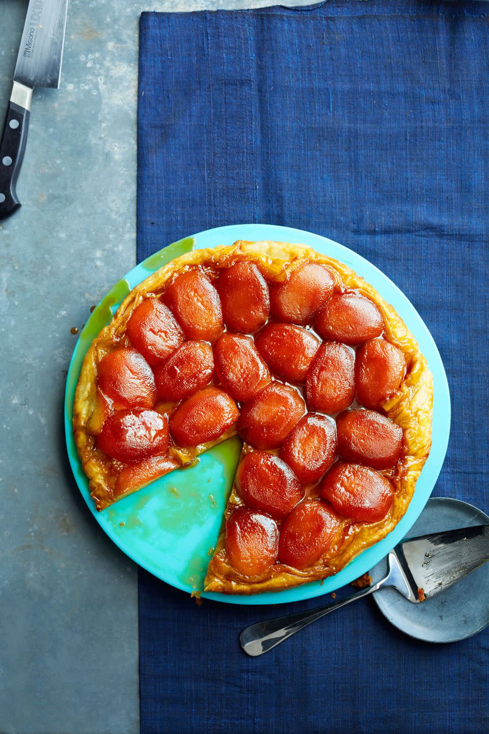 <p>Psst! It's a classic French tarte tatin, but we've made it over with our favorite shortcut - store-bought pastry. Irresistible!<br><br><a rel="nofollow noopener" href="https://www.womansday.com/food-recipes/food-drinks/recipes/a40019/caramel-apple-skillet-pie-recipe-ghk0914/" target="_blank" data-ylk="slk:Get the recipe.;elm:context_link;itc:0;sec:content-canvas" class="link "><strong>Get the recipe.</strong></a></p>