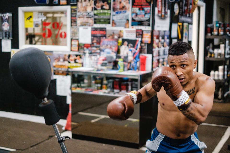 Professional boxer Andre Donovan, from Dennison, works through training sessions at T-County Boxing Academy, Thursday night, March 16 in New Philadelphia.