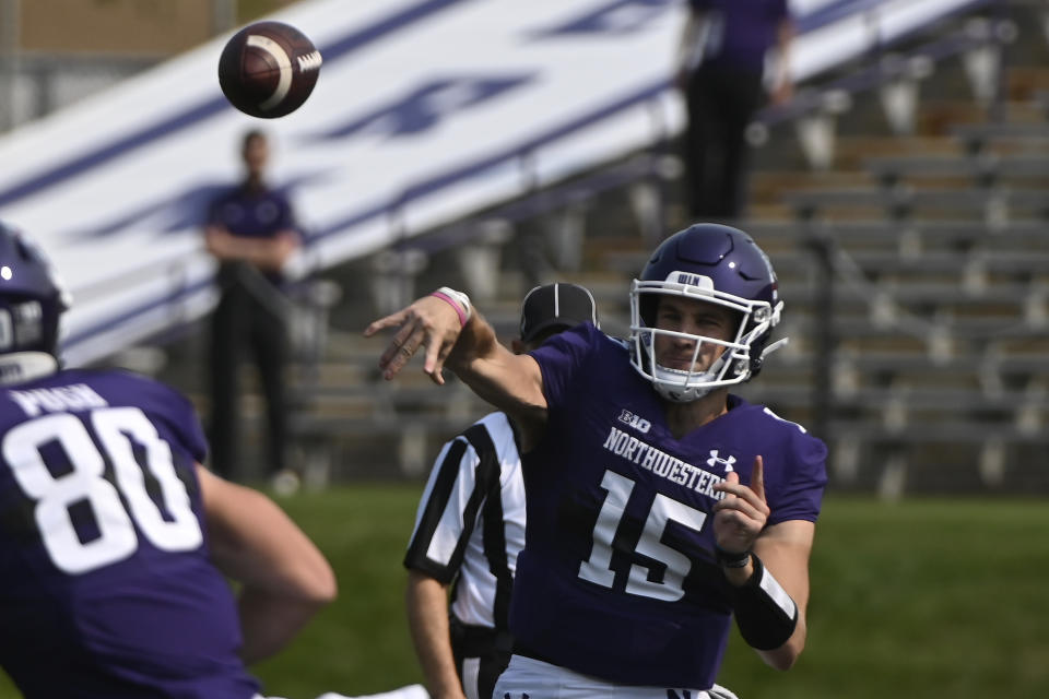 Northwestern quarterback Hunter Johnson (15) passes the ball against Indiana State during the first half of an NCAA college football game in Evanston, Ill, Saturday, Sept. 11, 2021. (AP Photo/Matt Marton)