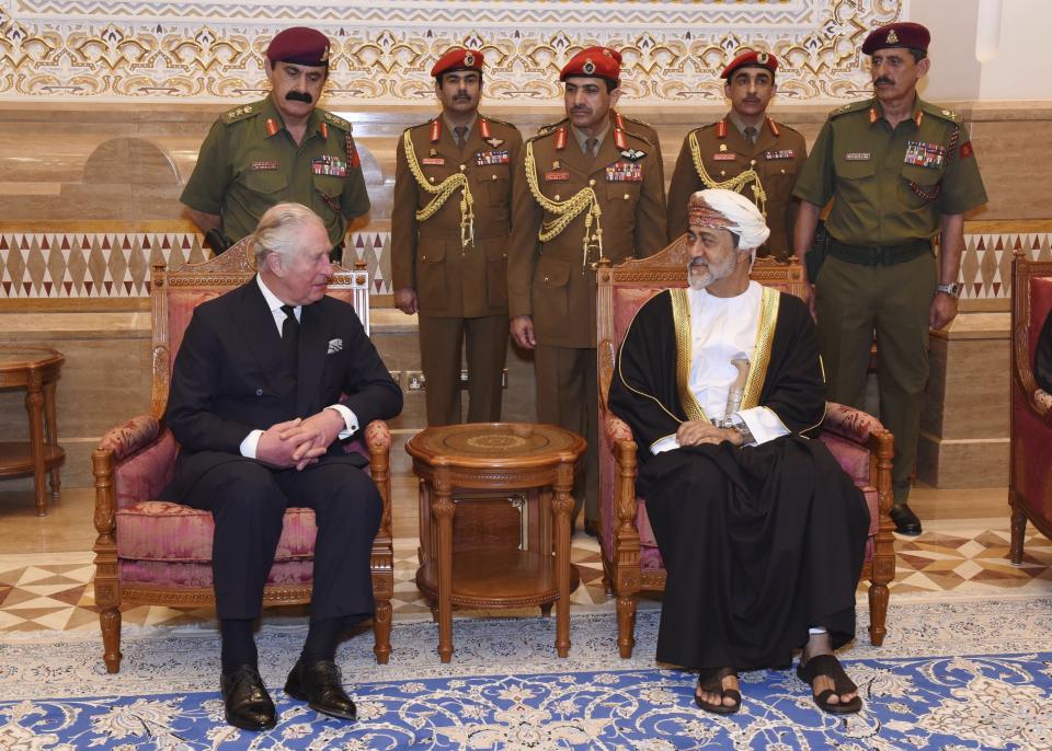 In this photo made available by Oman News Agency, Oman's new Sultan Haitham bin Tariq Al Said, right, receives The Prince of Wales after his arrival to attend the late Sultan Qaboos official mourning ceremony, in Muscat, Oman, Sunday, Jan. 12, 2020. (Oman News Agency via AP)