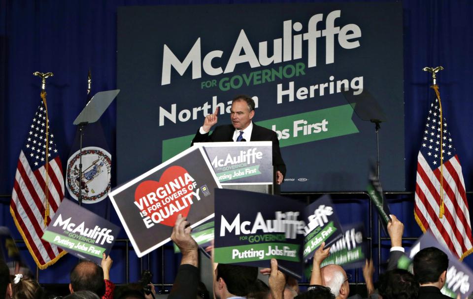 U.S. Senator Tim Kaine (D-VA) addresses the crowd during an election night rally for Virginia Democratic gubernatorial nominee Terry McAuliffe in Tyson's Corner, Virginia November 5, 2013. McAuliffe faces Republican candidate Ken Cuccinelli in today's governor's election in Virginia. REUTERS/Gary Cameron (UNITED STATES - Tags: POLITICS ELECTIONS)