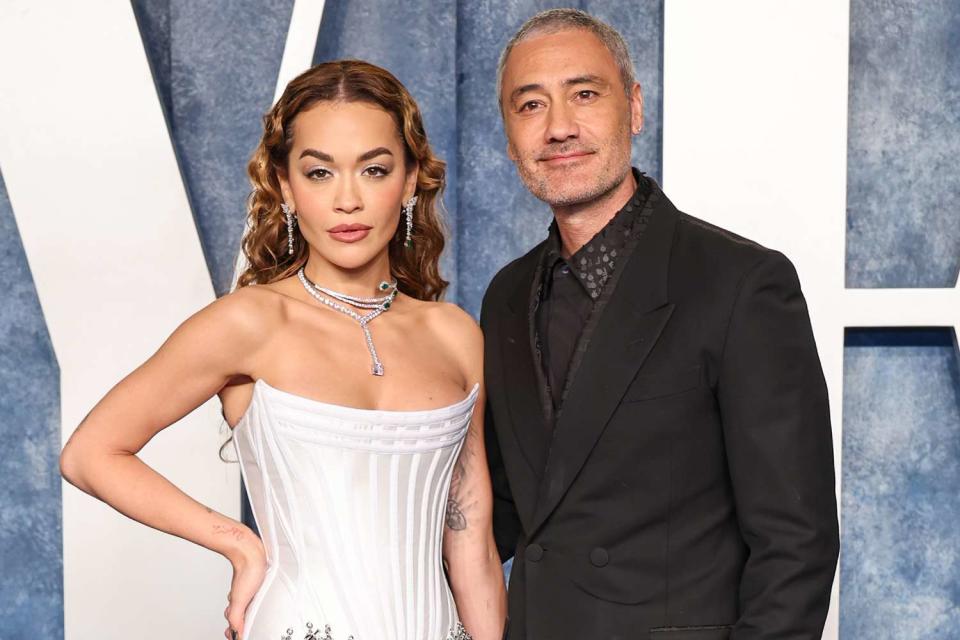 <p>Amy Sussman/Getty Images</p> Rita Ora and Taika Waititi