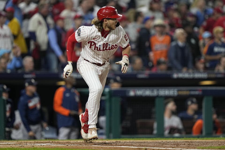 Philadelphia Phillies' Alec Bohm watches his home run during the second inning in Game 3 of baseball's World Series between the Houston Astros and the Philadelphia Phillies on Tuesday, Nov. 1, 2022, in Philadelphia. (AP Photo/David J. Phillip)