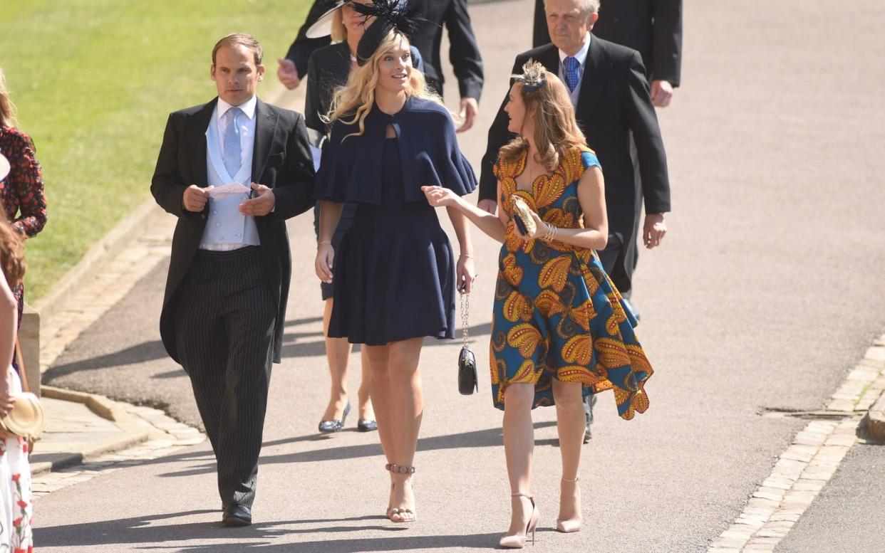 Chelsy Davy (centre in the navy dress) arriving at St George's Chapel this morning  - eddie_mulholland@hotmail.com