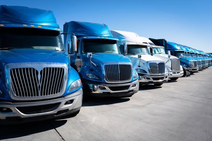 Long-haul trucks parked in a row.