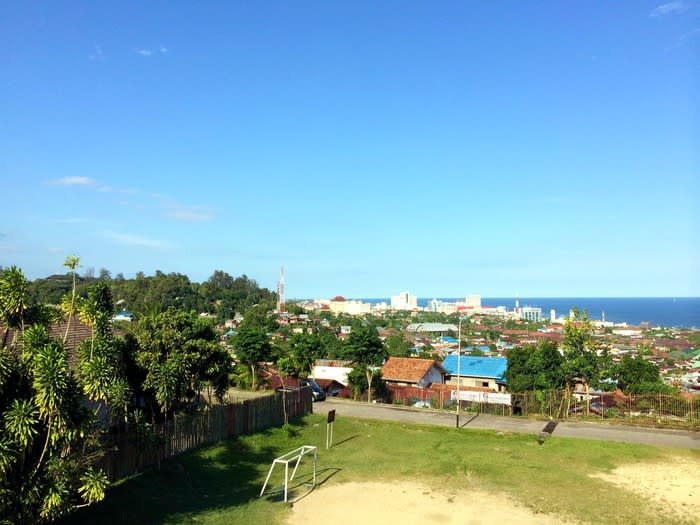 Awesome city view: Upon reaching Gunung Dubs in broad daylight, you get a glimpse of the city's unique features, its lush greenery and gorgeous shades of blue from the sky above and distant sea.