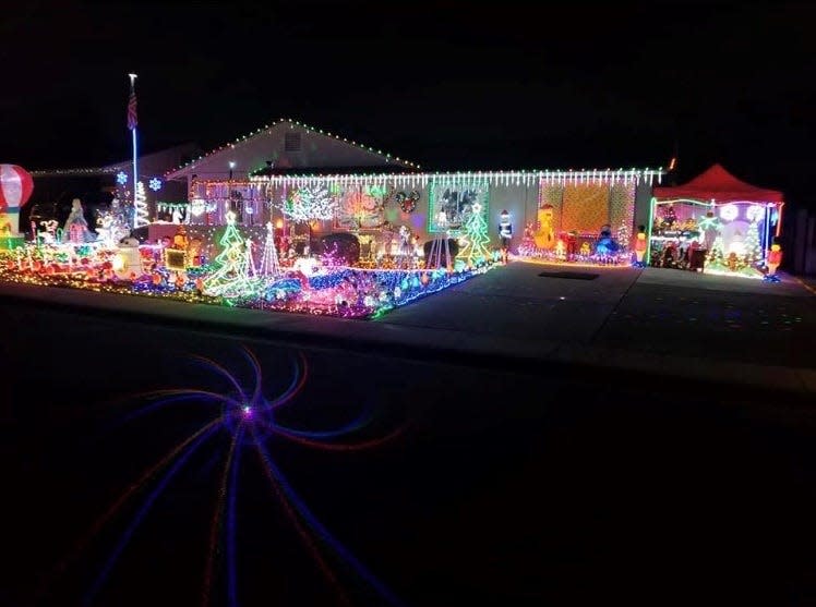 Tom Van Boven's display in Phoenix boasts 75,000 lights and is one of 100 displays to see when you use azcentral's map at holidaylights.azcentral.com.