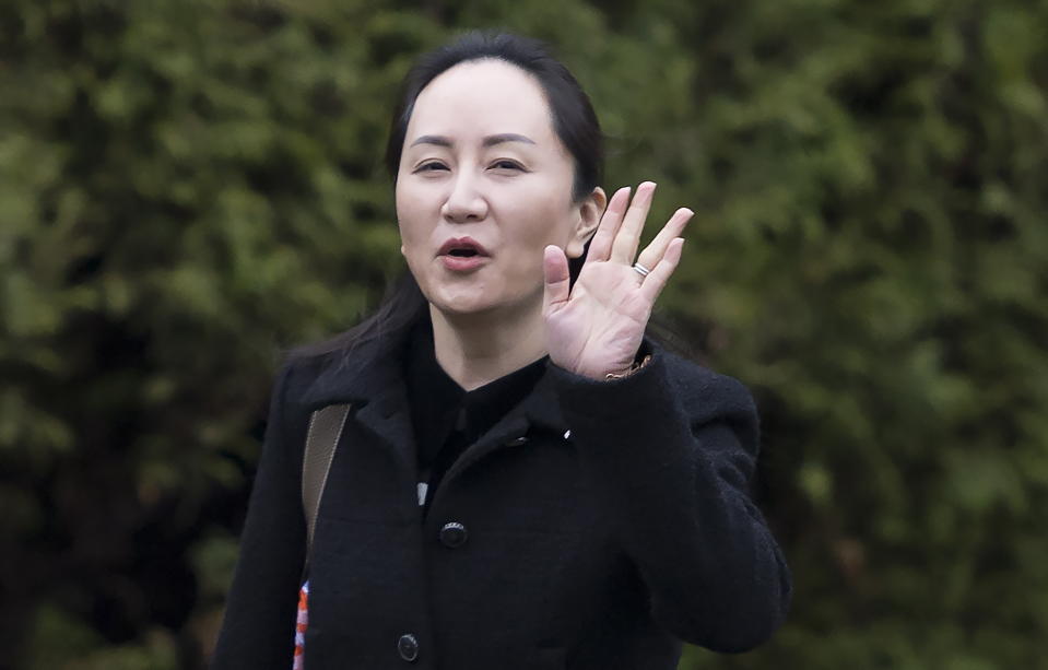 Meng Wanzhou, chief financial officer of Huawei leaves her home in Vancouver, Monday, January, 20, 2020. A court hearing begins today in Vancouver over the American request to extradite an executive of the Chinese telecom giant Huawei on fraud charges. (Jonathan Hayward/The Canadian Press via AP)