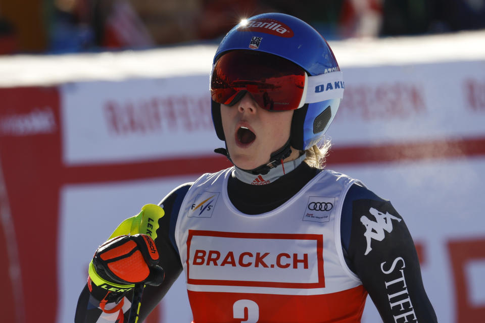 United States' Mikaela Shiffrin checks her time at the finish area of an alpine ski, women's World Cup downhill race, in St. Moritz, Switzerland, Saturday, Dec.9, 2023. (AP Photo/Alessandro Trovati)