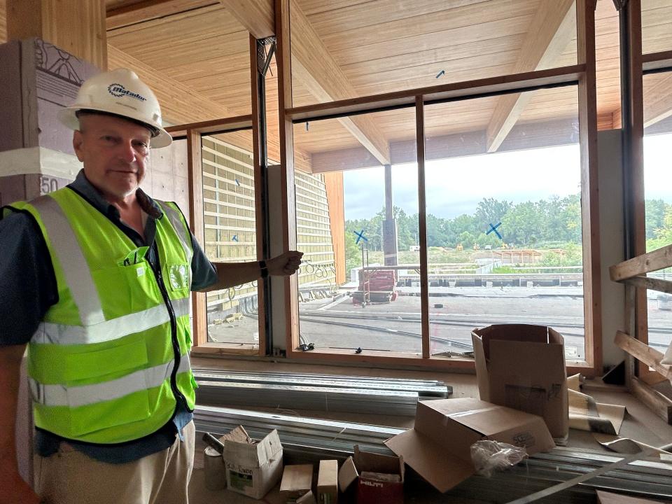 Dr. Ken Lacovara points to a veranda at Rowan University's Edelman Fossil Park and Museum. The site will open in 2024.