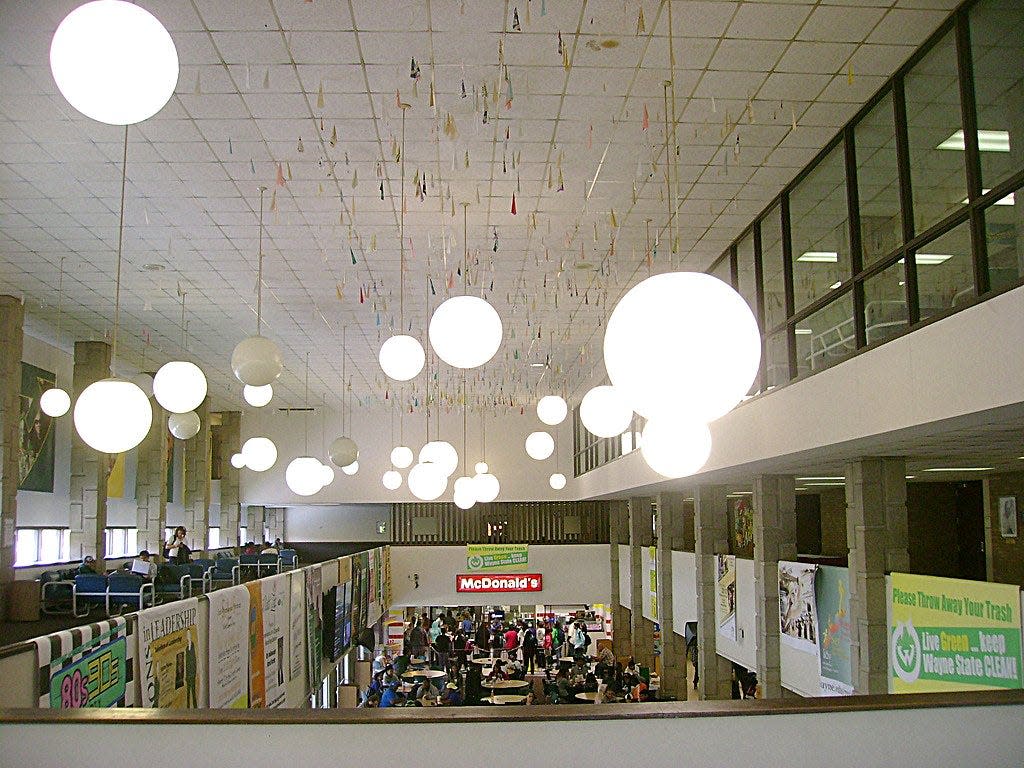 Paper airplanes hang from the ceiling in the dining commons at Wayne State University’s Student Center. The unique campus tradition of flinging them from 2½ stories below came to an end when the area was remodeled in 2014.
