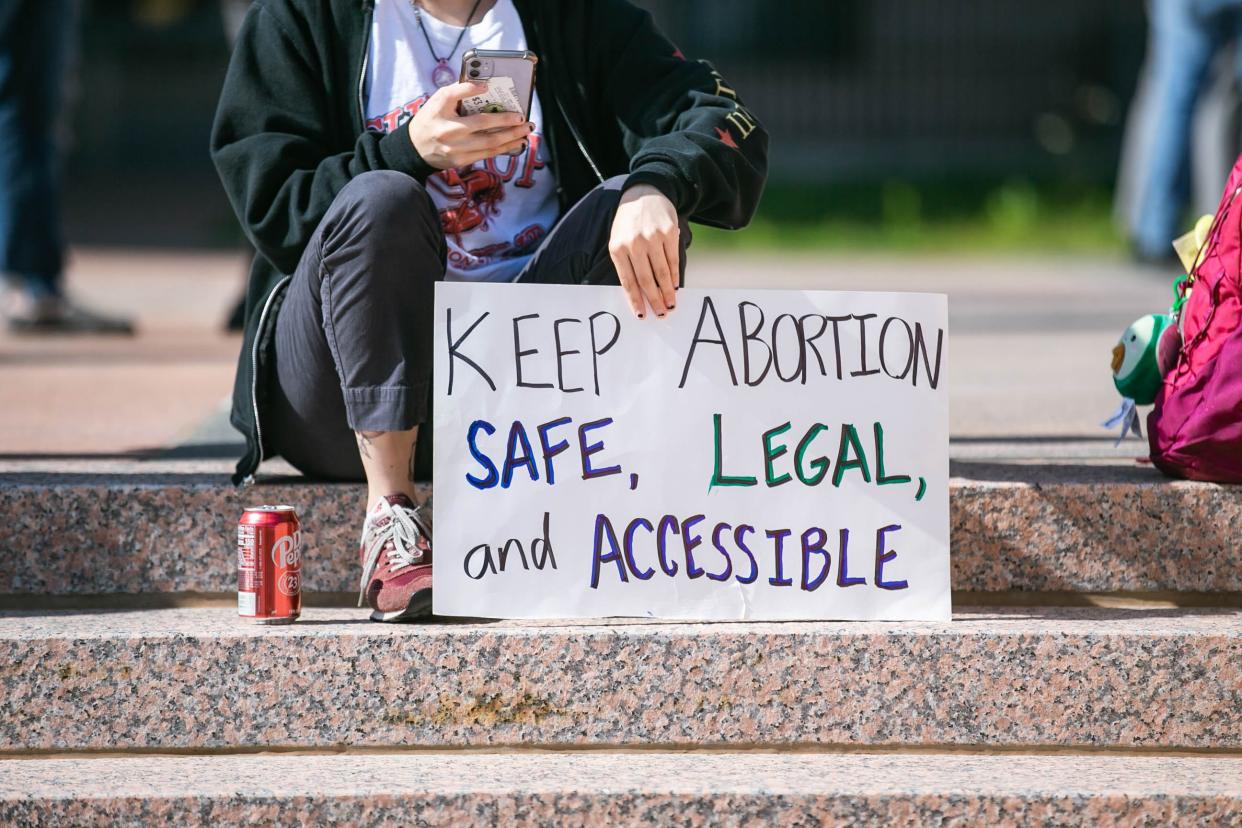 Demonstrators gathered in May at the Oklahoma Capitol to protest the signing into law of an abortion ban. The state Supreme Court Tuesday temporarily halted enforcement of three anti-abortion laws passed in 2021.