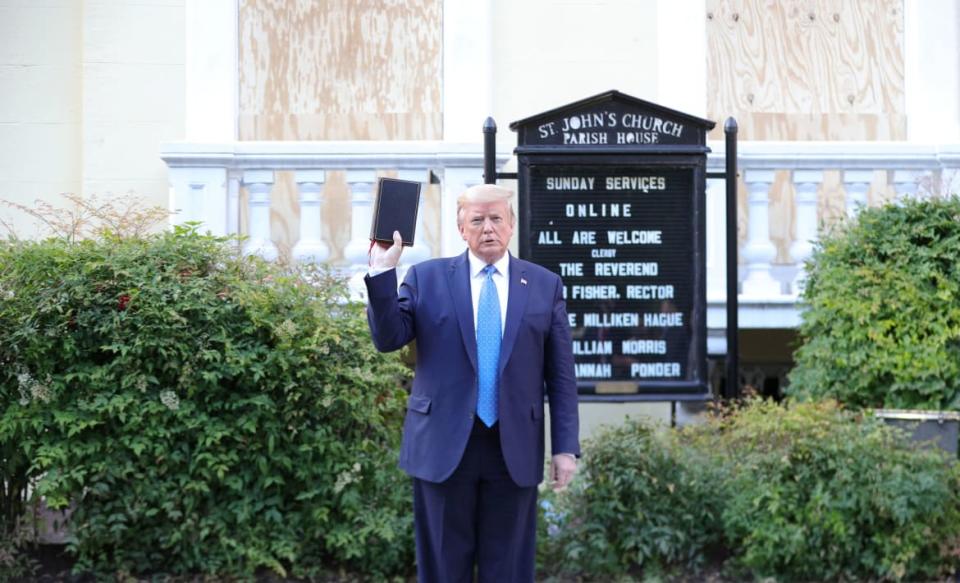 <div class="inline-image__caption"><p>U.S. President Donald Trump held up a Bible as he stood in front of St. John's Episcopal Church across from the White House after walking there for a photo opportunity during ongoing protests over racial inequality in the wake of the death of George Floyd while in Minneapolis police custody, at the White House in Washington, U.S., June 1, 2020.</p></div> <div class="inline-image__credit">Tom Brenner/Reuters</div>