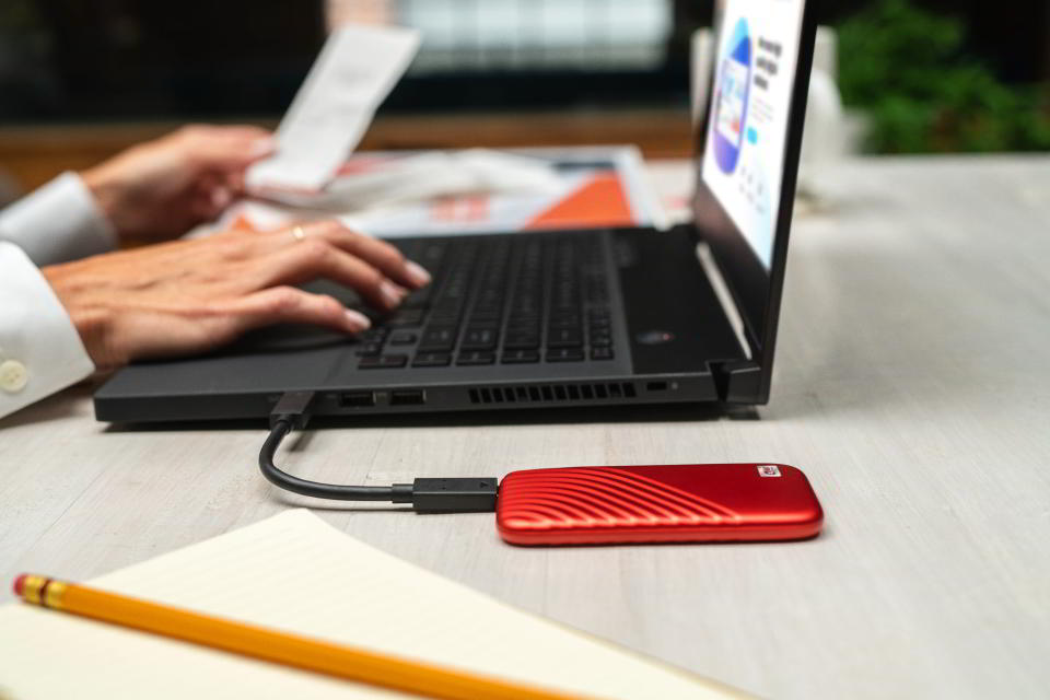 Safeguard your work with an external drive, be it a thumbstick, portable hard drive, or (pictured here) small SSD.
