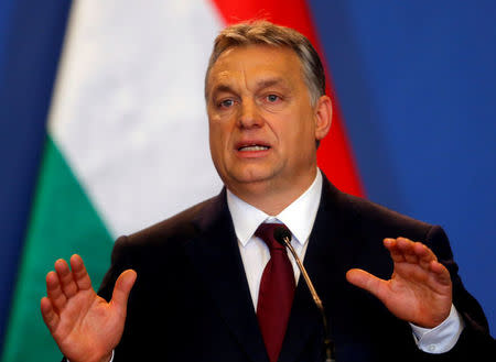 FILE PHOTO: Hungarian Prime Minister Viktor Orban speaks during a news conference following the talks with Russian President Vladimir Putin in Budapest, Hungary, February 2, 2017. Picture taken February 2, 2017. REUTERS/Laszlo Balogh/File Photo