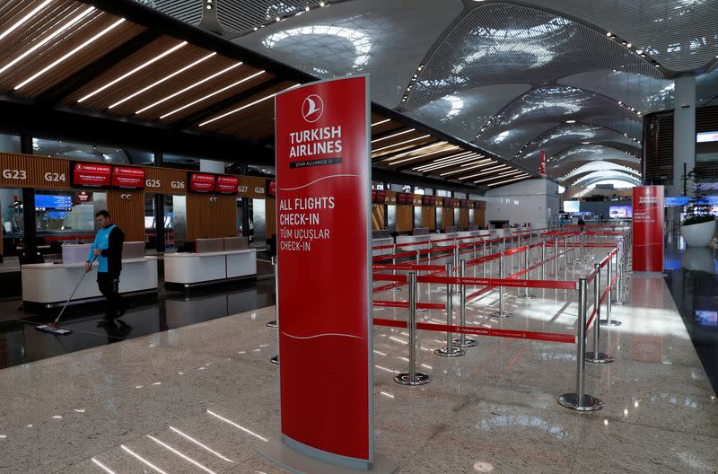 FILE PHOTO: A Turkish Airlines counter is pictured at the departure terminal of the Istanbul International Airport in Istanbul