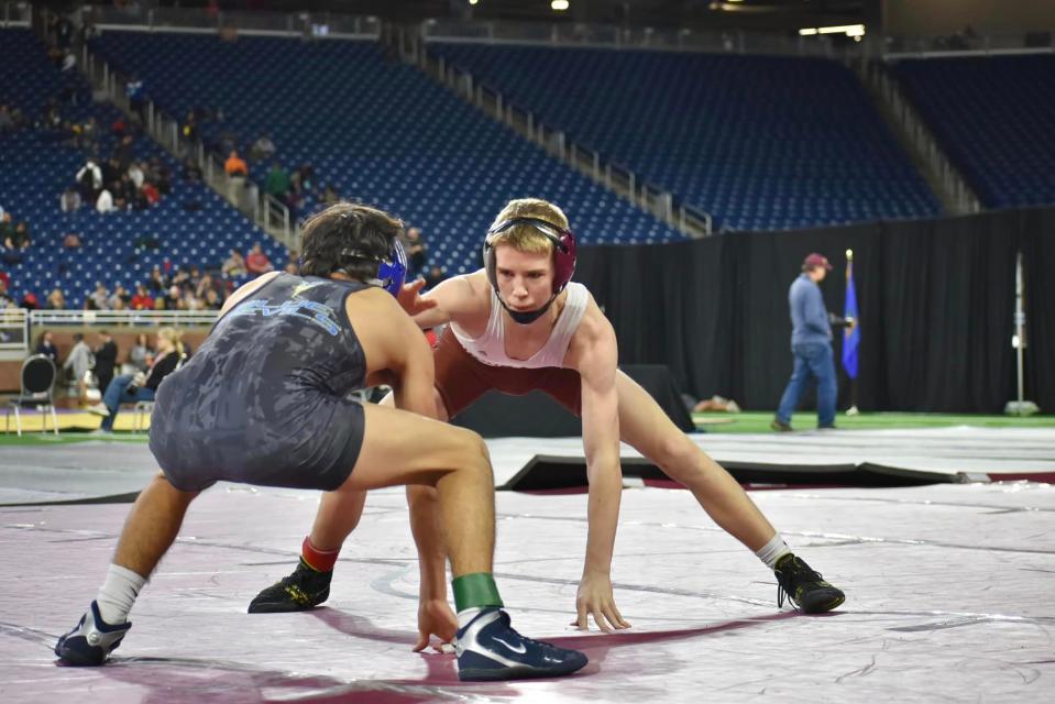 Union City's Logan Mears measures his opponent during the third place match at the MHSAA State Finals. Mears finished third after winning this match by a 4-0 decision