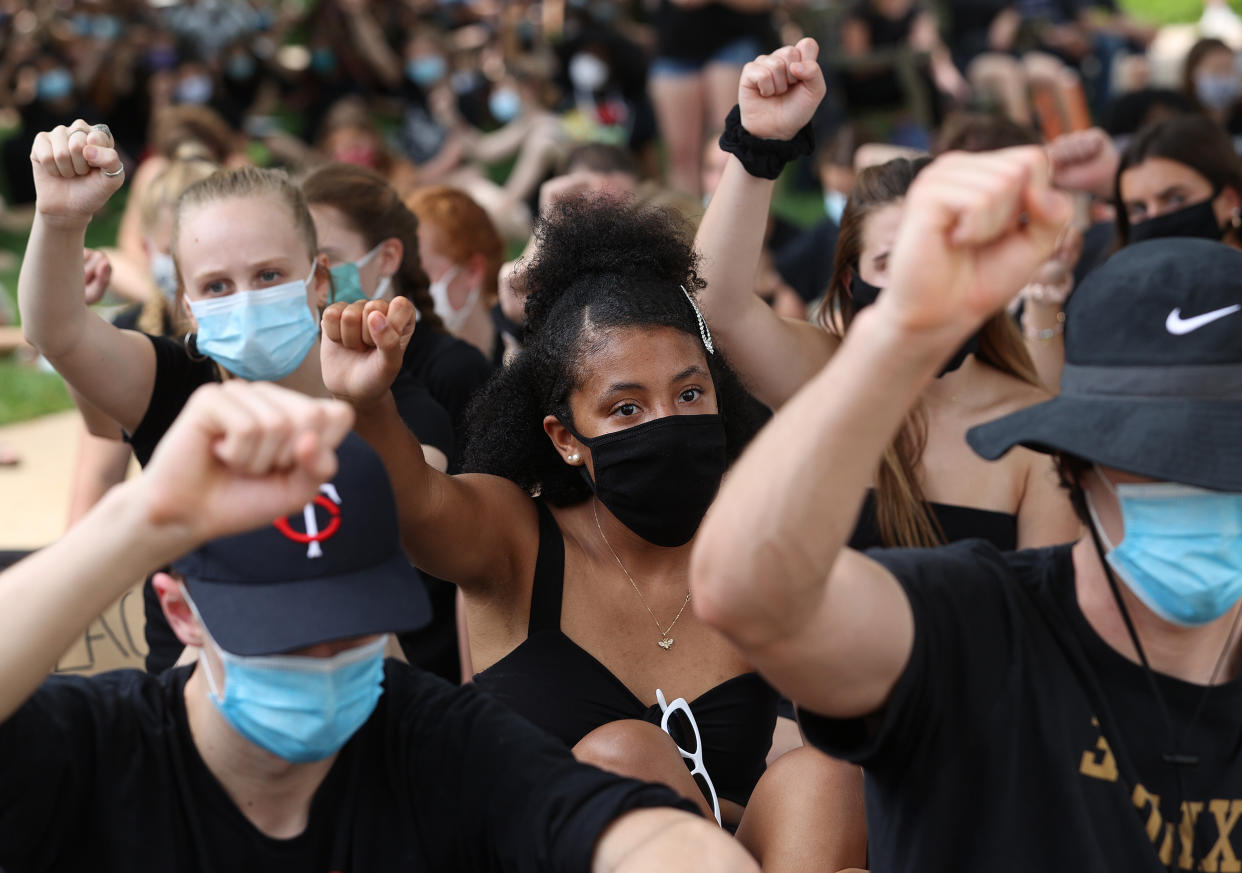 Students participate in a Black Lives Matter sit-in at the National Cathedral on June 5 in Washington, D.C., during a peaceful protest against police brutality and the death of George Floyd. (Photo: Win McNamee via Getty Images)