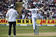 India's Jasprit Bumrah runs to celebrate the dismissal of England's Ollie Pope during the fourth day of the fifth cricket test match between England and India at Edgbaston in Birmingham, England, Monday, July 4, 2022. (AP Photo/Rui Vieira)