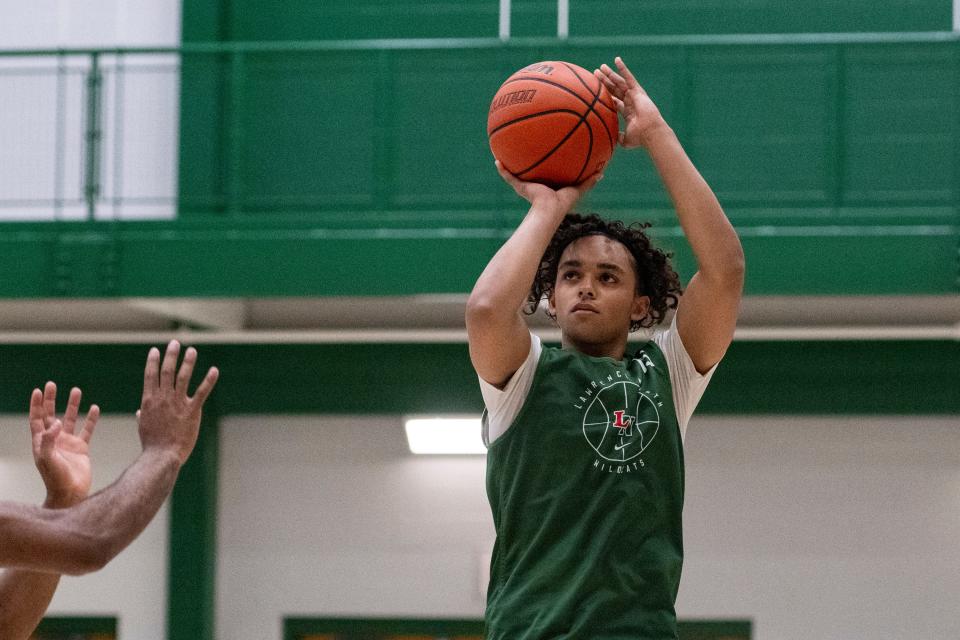 Lawrence North High School's Myles Baker (15) shoots during Charlie Hughes Shootout basketball action, Saturday, June 24, 2023, at Westfield High School.