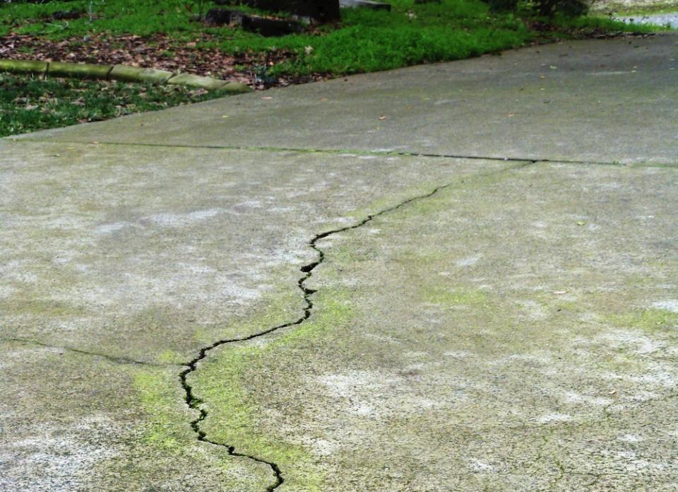 <body> <p>Between vehicle traffic and weather exposure, your concrete driveway undergoes a lot of stress. If yours has begun to show signs of wear, whether in the form of staining, flaking, or crazing (tiny, spider web-like cracks), be aware that you can eliminate any such cosmetic imperfections with a resurfacer like <a rel="nofollow noopener" href=" http://www.bobvila.com/articles/spalling-concrete/?bv=yahoo" target="_blank" data-ylk="slk:Rapid Set Newcrete;elm:context_link;itc:0;sec:content-canvas" class="link ">Rapid Set Newcrete</a>. Resurfacers spread out over the old concrete, creating a pristine, like-new surface that improves both the aesthetic appeal and the longevity of your driveway. The best part? With NewCrete, there's no complex curing process. In fact, the product cures all on its own, and blazingly fast—you can drive on your good-as-new driveway in just 24 hours.</p> </body>