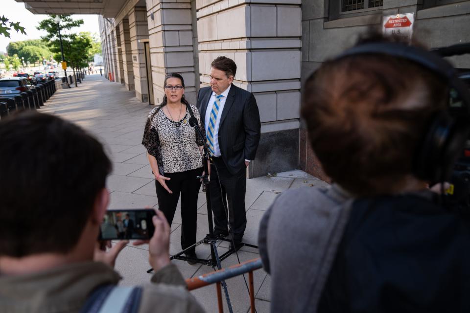 Angel Harrelson, Kenneth Harrelson’s wife, speaks to press next to defense lawyer Bradley Geyer after Kenneth’s sentencing hearing for his role in the January 6, 2021 attack on the U.S. Capitol in Washington May 26, 2023.