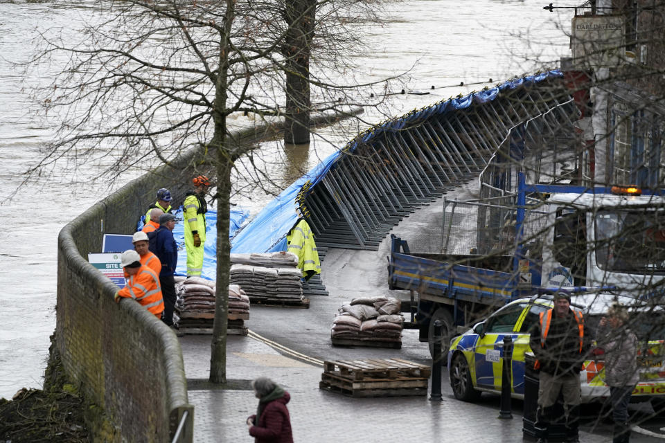 IRONBRIDGE,  - FEBRUARY 18: Flood barriers are erected on the banks of the River Seven following Storm Dennis on February 17, 2020 in Ironbridge, England. Storm Dennis is the second named storm to bring extreme weather in a week and follows in the aftermath of Storm Ciara. Although water is residing in many places flood warnings are still in place. (Photo by Christopher Furlong/Getty Images)