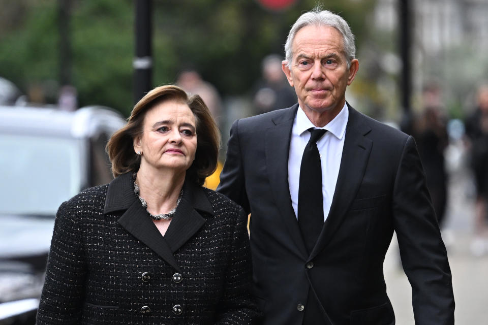 Former Prime Minister Tony Blair and wife Cherie attend the funeral of Derek Draper at St Mary the Virgin Church. (Getty)