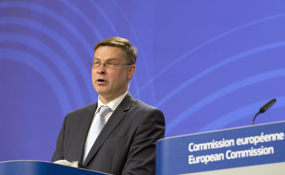 European Commissioner for Euro and Social Dialogue Valdis Dombrovskis speaks during a media conference at EU headquarters in Brussels, Wednesday, June 5, 2019. European Commissioners met in Brussels on Wednesday for their routine weekly college session, with talks focusing on EU economic forecasts and notably Italy's failure to control its debt. (AP Photo/Virginia Mayo)