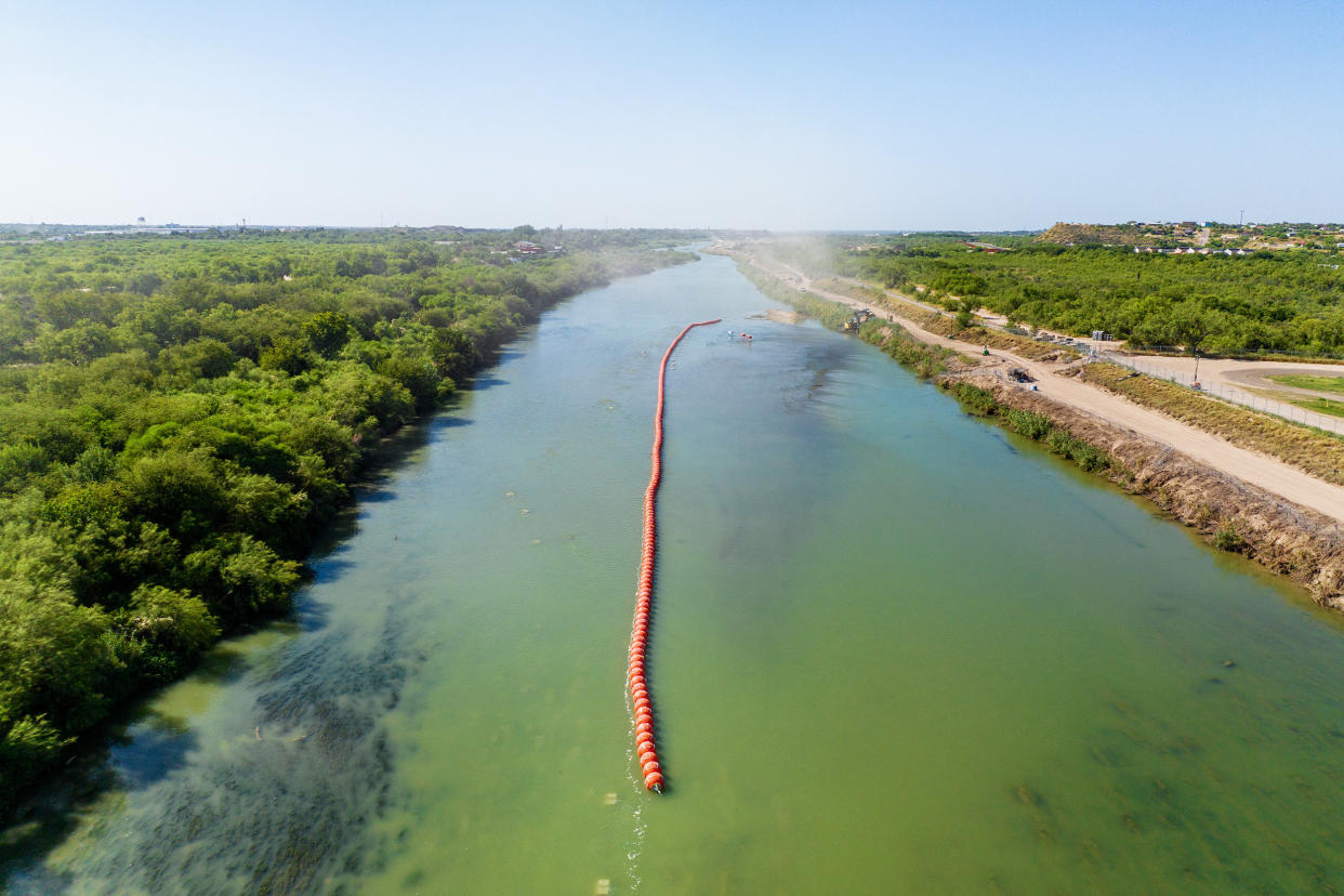 Buoy barriers are installed in the middle of the Rio Grande river in Eagle Pass, Texas, (Brandon Bell / Getty Images)