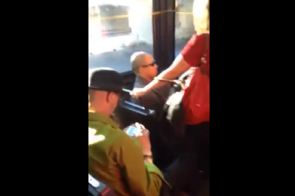 'Leprechaun' refuses to move bag to give woman seat on bus