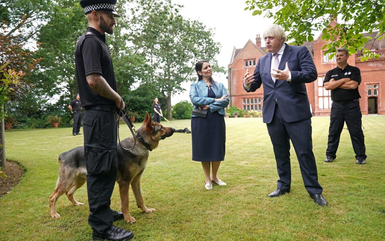 Boris Johnson and Priti Patel visit Surrey Police headquarters to launch the Government's Beating Crime Plan - Yui Mok/PA Wire